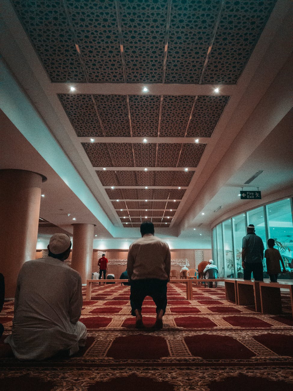 man sitting on floor inside room